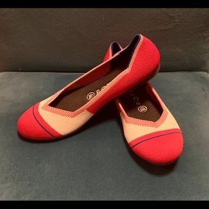 Red, white, and blue Rothy’s flats